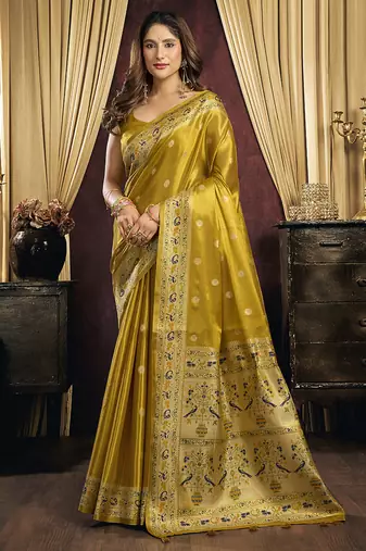 mustard tissue with tassels traditional wear saree
