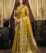 mustard tissue with tassels traditional wear saree