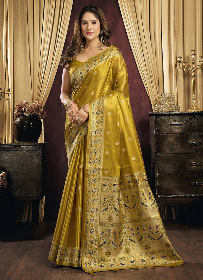 mustard tissue with tassels traditional wear saree