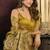 mustard tissue with tassels traditional wear saree