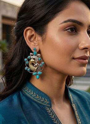 Dual plated peacock motif silver earrings 3