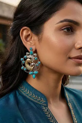Dual plated peacock motif silver earrings
