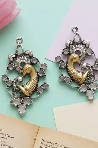 Dual plated peacock motif statement earrings