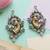 Dual plated peacock motif statement earrings