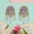 Dual tone silver kundan floral earrings