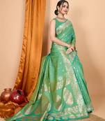 green zari work banarasi silk blend saree with blouse