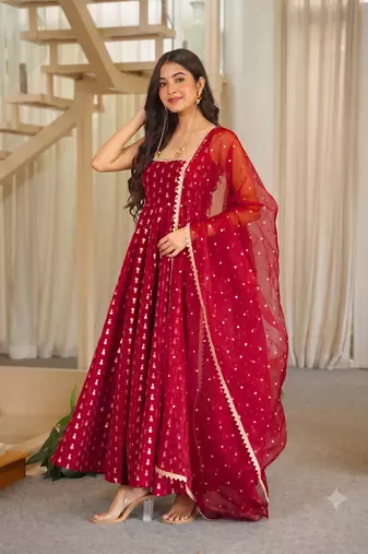 Maroon sleeveless square neck flared anarkali kurta set with pant and embellished net dupatta