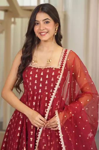 Maroon sleeveless square neck flared anarkali kurta set with pant and embellished net dupatta