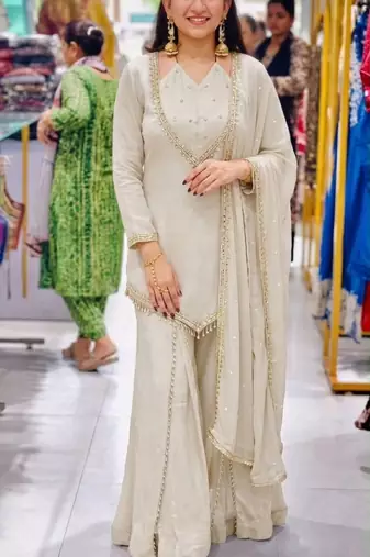 White silk blend readymade suit with miroor & moti work