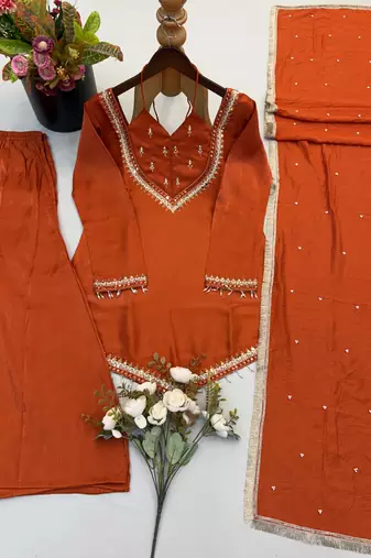 Rust silk blend readymade suit with miroor & moti work