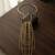 Gold metallic wire cage necklace