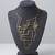 Gold metallic wire maze choker necklace