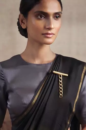 Gold chain drop pin brooch