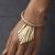 Gold fringe fan hinged bangle