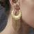 Gold hammered hoop fringe earrings