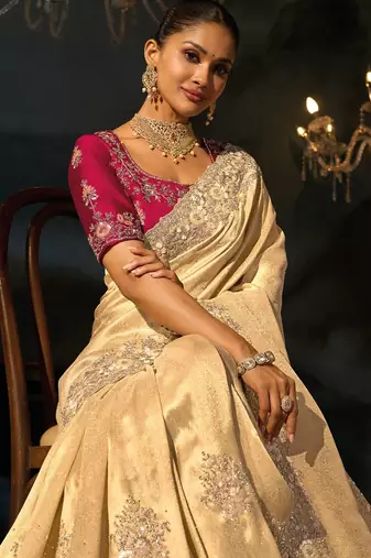 Cream kanjivaram jacquard zari, sequins, cut-dana with moti heavy hand work saree with blouse