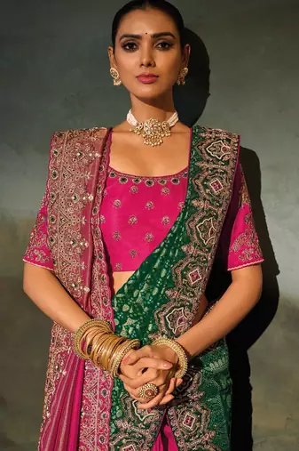 rani pink kanchipuram silk blend zari, thread, moti with cut-dana moti heavy hand work saree with blouse