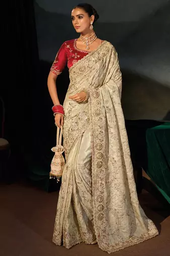 Cream kanjivaram zari, thread, zarkan, cut-dana with moti heavy hand work saree with blouse