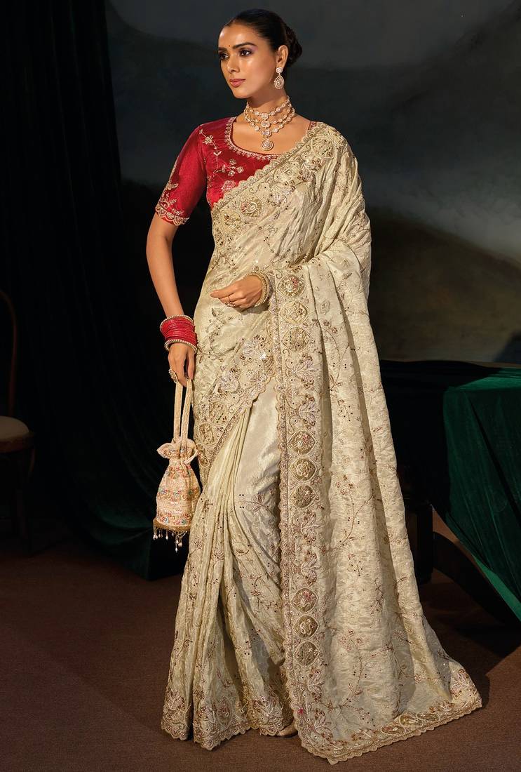 Cream kanjivaram zari, thread, zarkan, cut-dana with moti heavy hand work saree with blouse