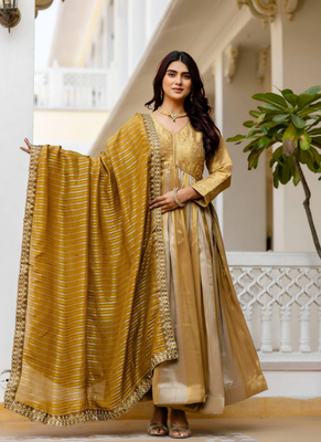Antique gold heavy embroidery work banarasi silk gown with dupatta 1