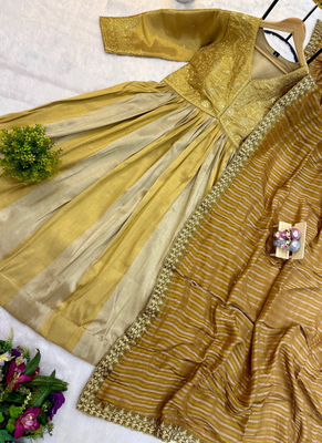Antique gold heavy embroidery work banarasi silk gown with dupatta 5