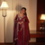 Maroon beads & sequins embroidered vichitra silk gown set