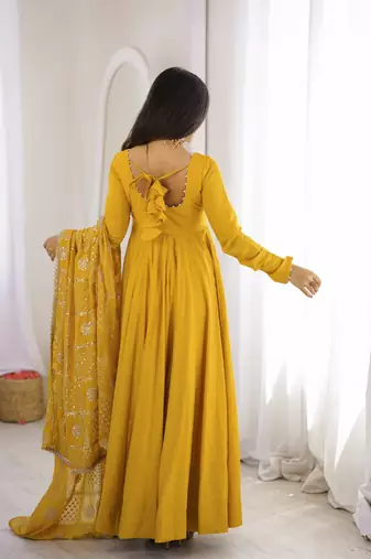 Yellow roman chanderi gown with pant & heavy zari work dupatta