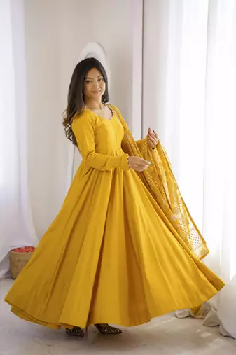 Yellow roman chanderi gown with pant & heavy zari work dupatta
