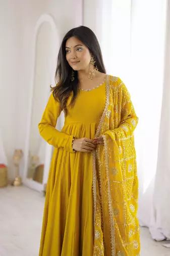 Yellow roman chanderi gown with pant & heavy zari work dupatta