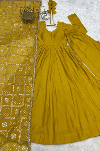 Yellow roman chanderi gown with pant & heavy zari work dupatta