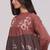 Rust and warm cocoa floral kurta with stripe bottom set