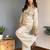 Cream embroidered mirror work chinon silk kurta palazzo set with striped dupatta