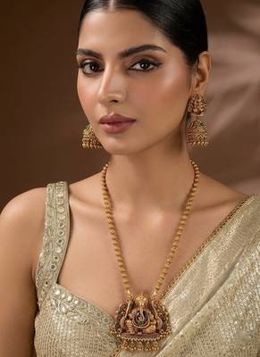 South indian long mala ganesh jii green necklace set with earrings for women. 1