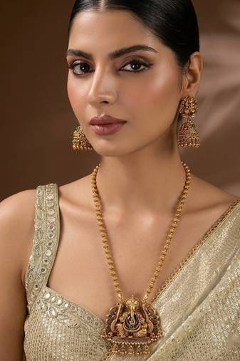 South indian long mala ganesh jii green necklace set with earrings for women.