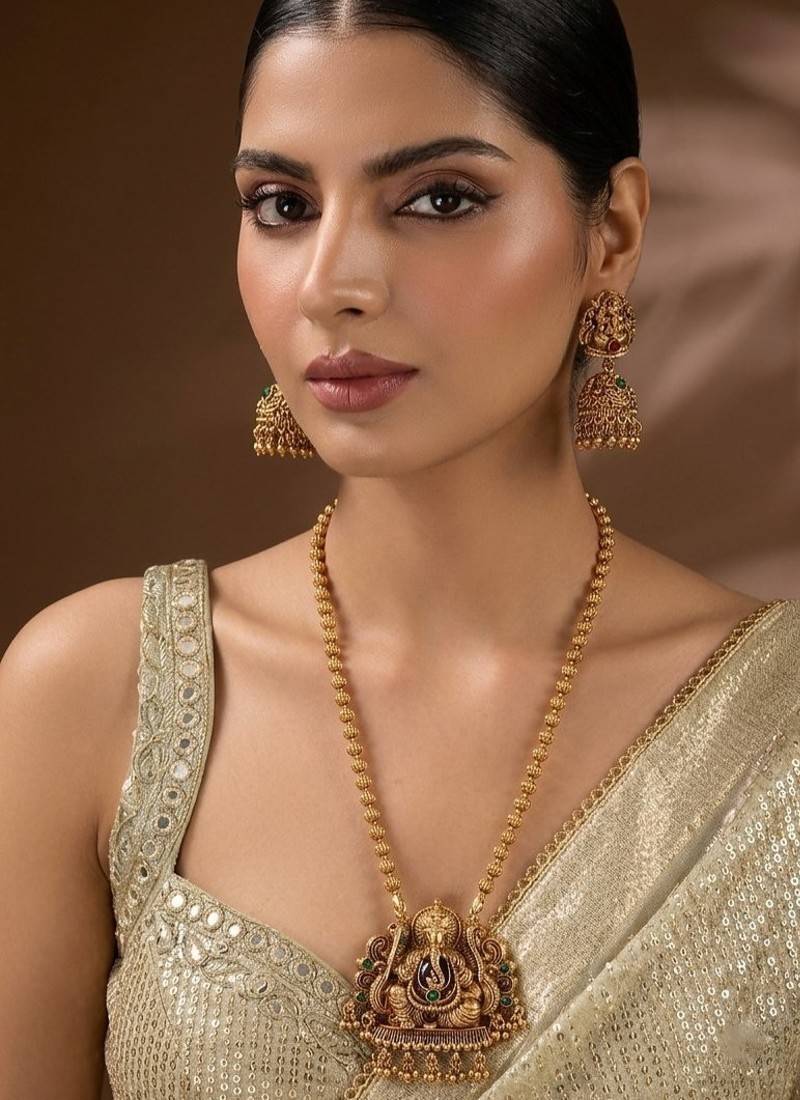 South indian long mala ganesh jii green necklace set with earrings for women.
