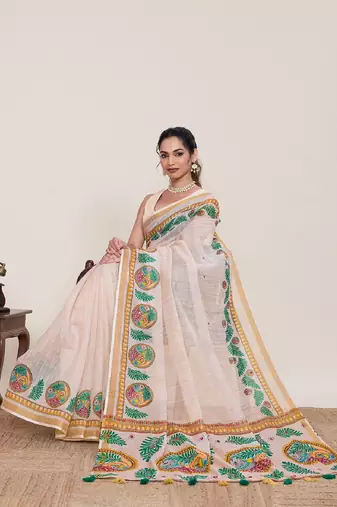 Peach printed zari border with mirror work linan saree with blouse