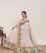 Peach printed zari border with mirror work linan saree with blouse