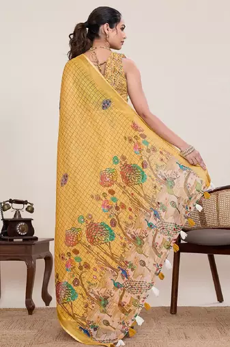 Yellow printed zari border with mirror work linan saree with blouse