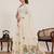 White printed zari border with mirror work linan saree with blouse