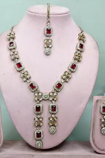 Maroon yellow gold premium designer american diamond and stone work necklace set