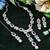 Maroon rhodium premium designer american diamond and stone work necklace set