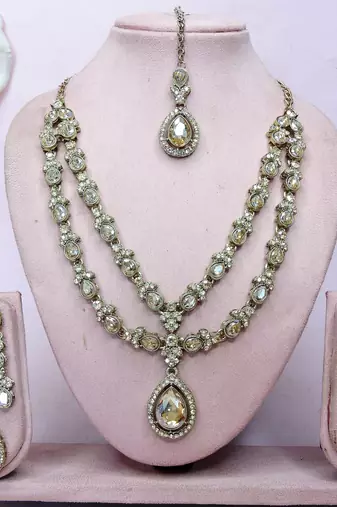 Gold yellow gold premium designer american diamond and stone work necklace set
