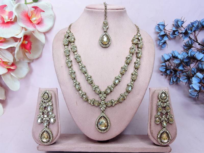 Gold yellow gold premium designer american diamond and stone work necklace set
