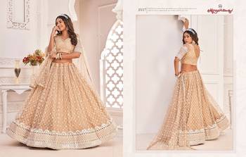 Chiku Net Embroidered & Zari Work Semi Stitched Lehenga Choli 3