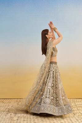 Ivory Net Embroidered & Thread Work Semi Stitched Lehenga Choli 3