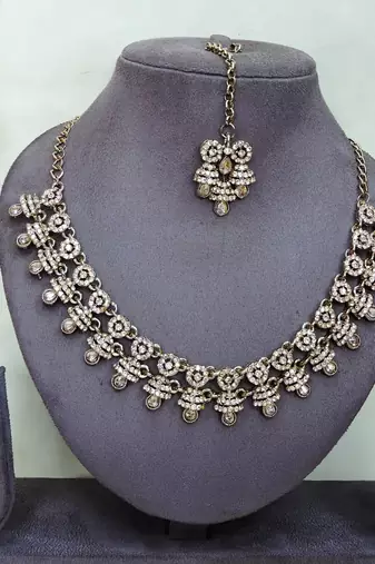 Gold yellow gold premium designer american diamond and stone work necklace set