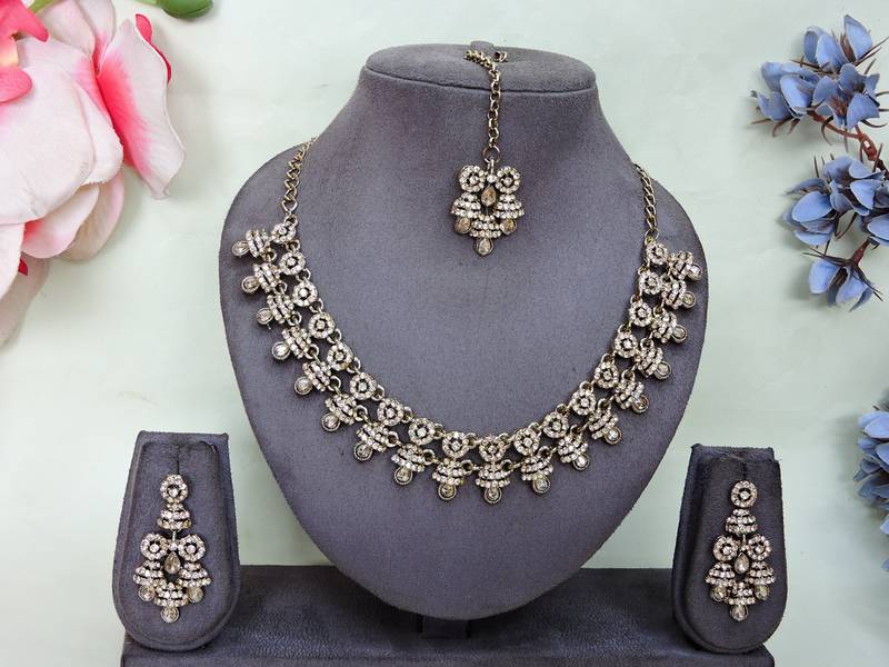 Gold yellow gold premium designer american diamond and stone work necklace set