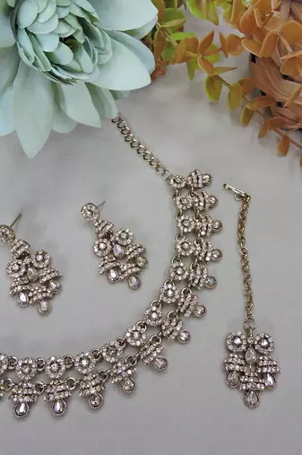 Gold yellow gold premium designer american diamond and stone work necklace set