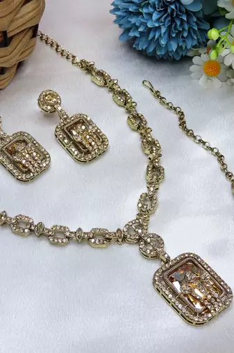 Gold yellow gold premium designer american diamond and stone work necklace set
