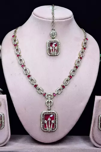 Pink yellow gold premium designer american diamond and stone work necklace set